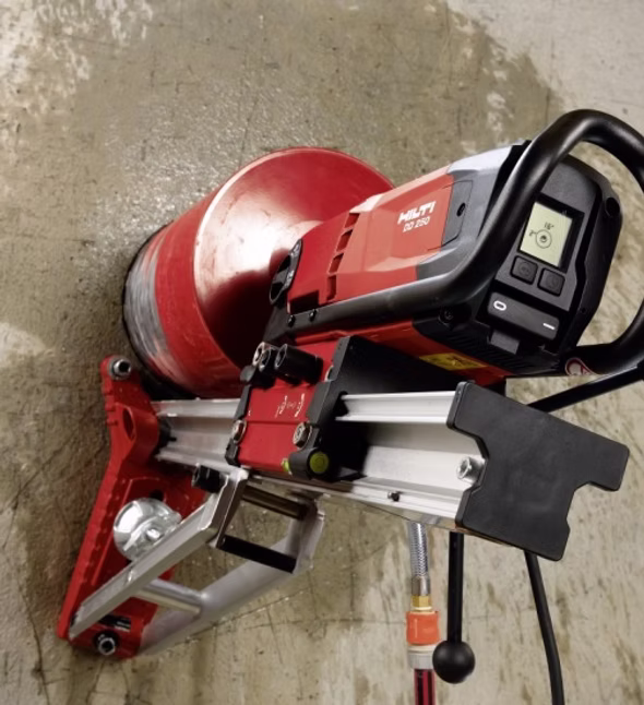 Diamond core drilling creating a clean opening through concrete