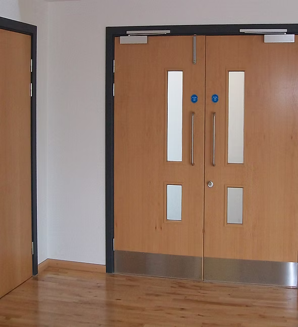 Fire door installation and inspection in a commercial corridor
